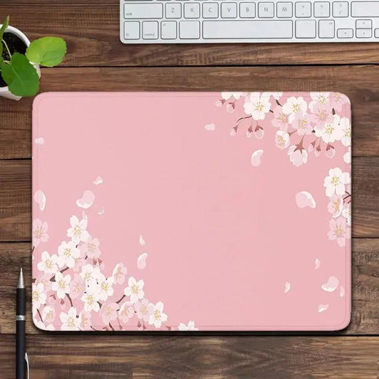 Cute Pink Mouse Pad on a wooden background